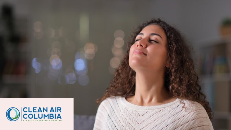 | Clean Air Columbia Woman breathing in clean air